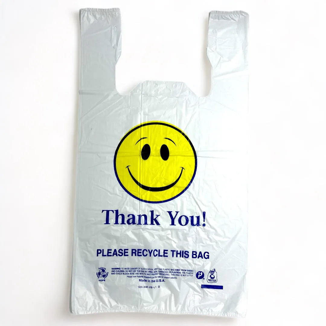 12X7X21 SMILE FACE PLASTIC  BAGS 1/6 14 MIC 500CT