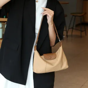 Niche women's bags, high-end leather dumpling bags, New color contrast TOGO first-layer cowhide shoulder messenger bag 66049
