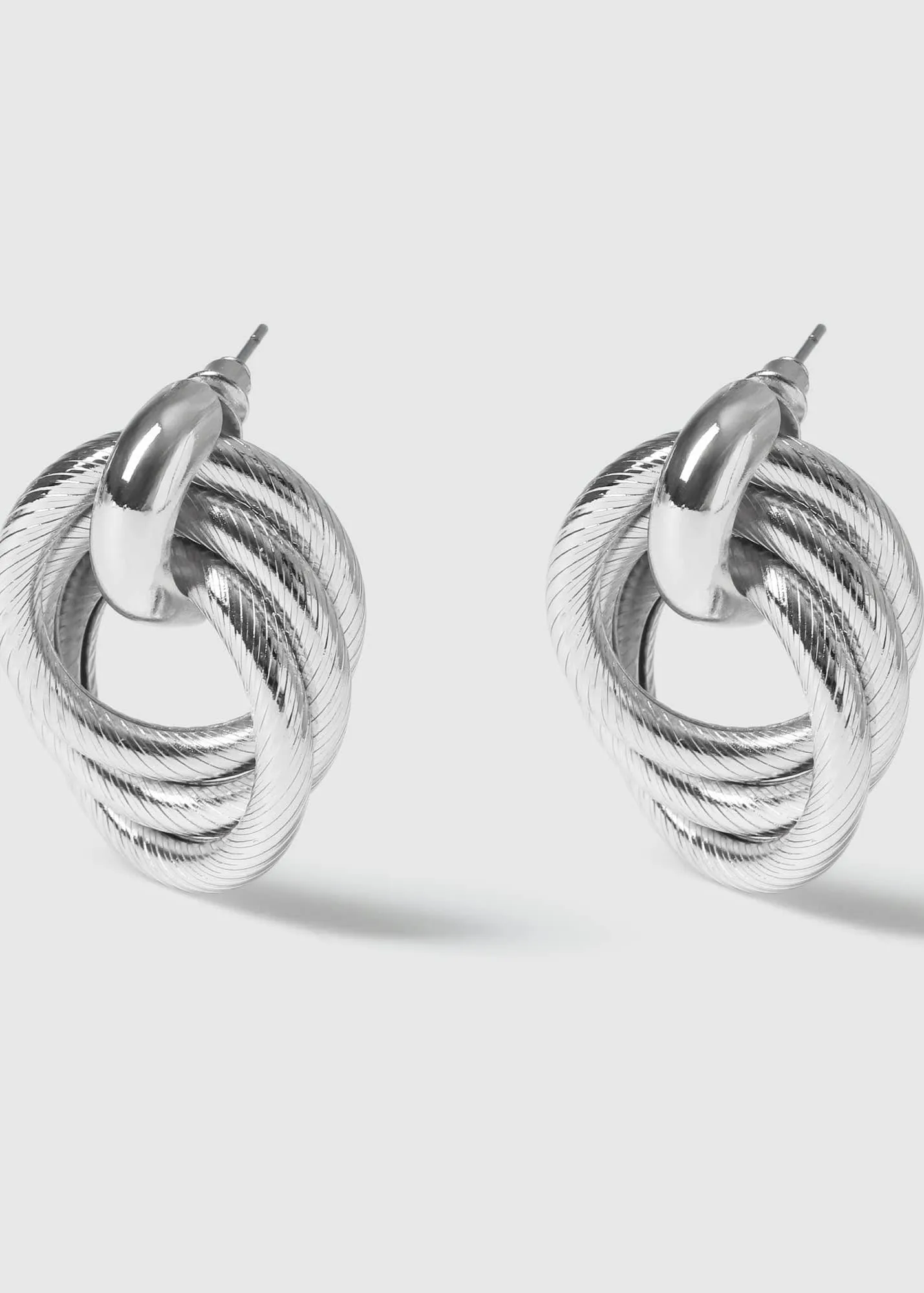 STATEMENT KNOT EARRINGS - SILVER PLATED
