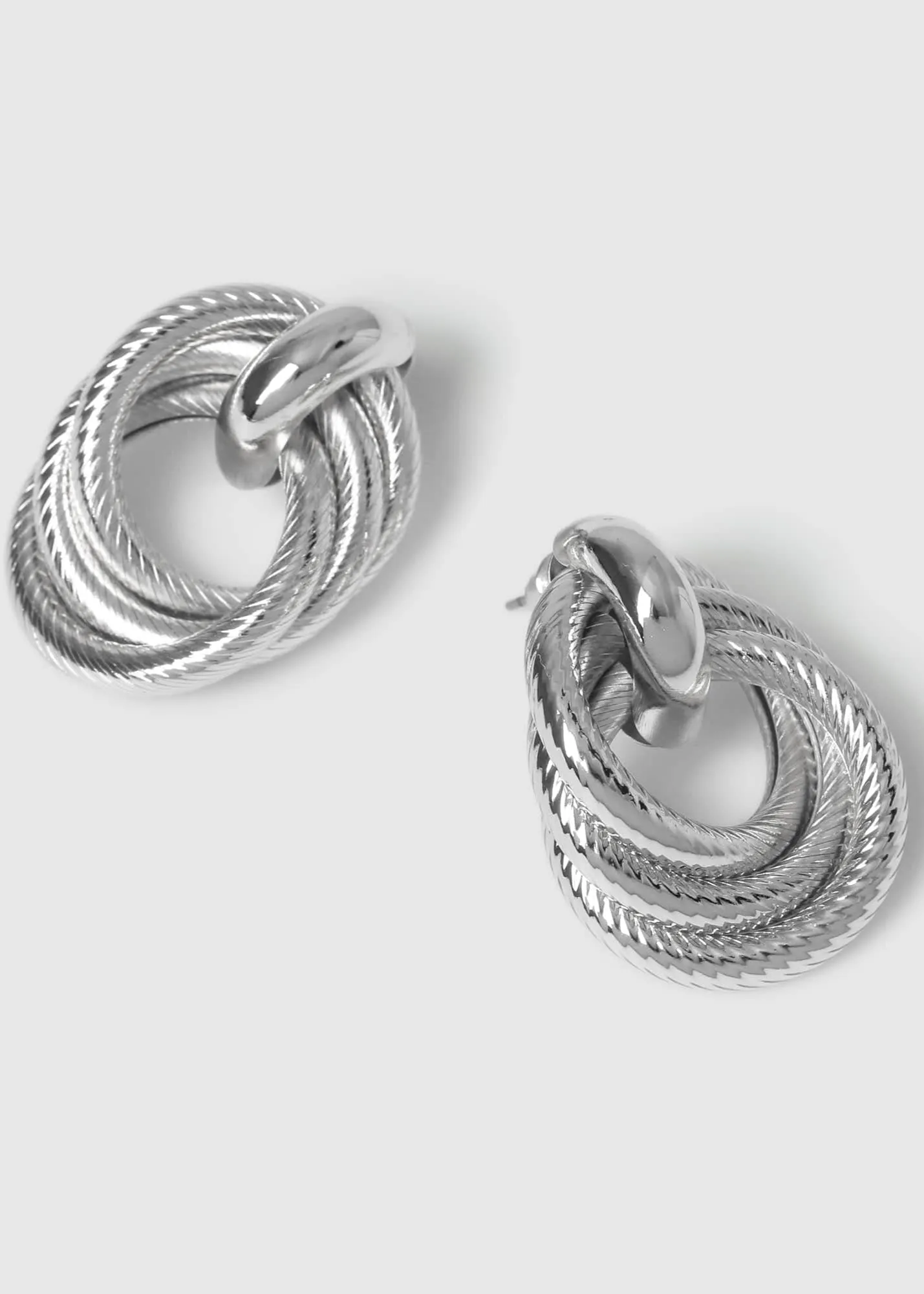 STATEMENT KNOT EARRINGS - SILVER PLATED