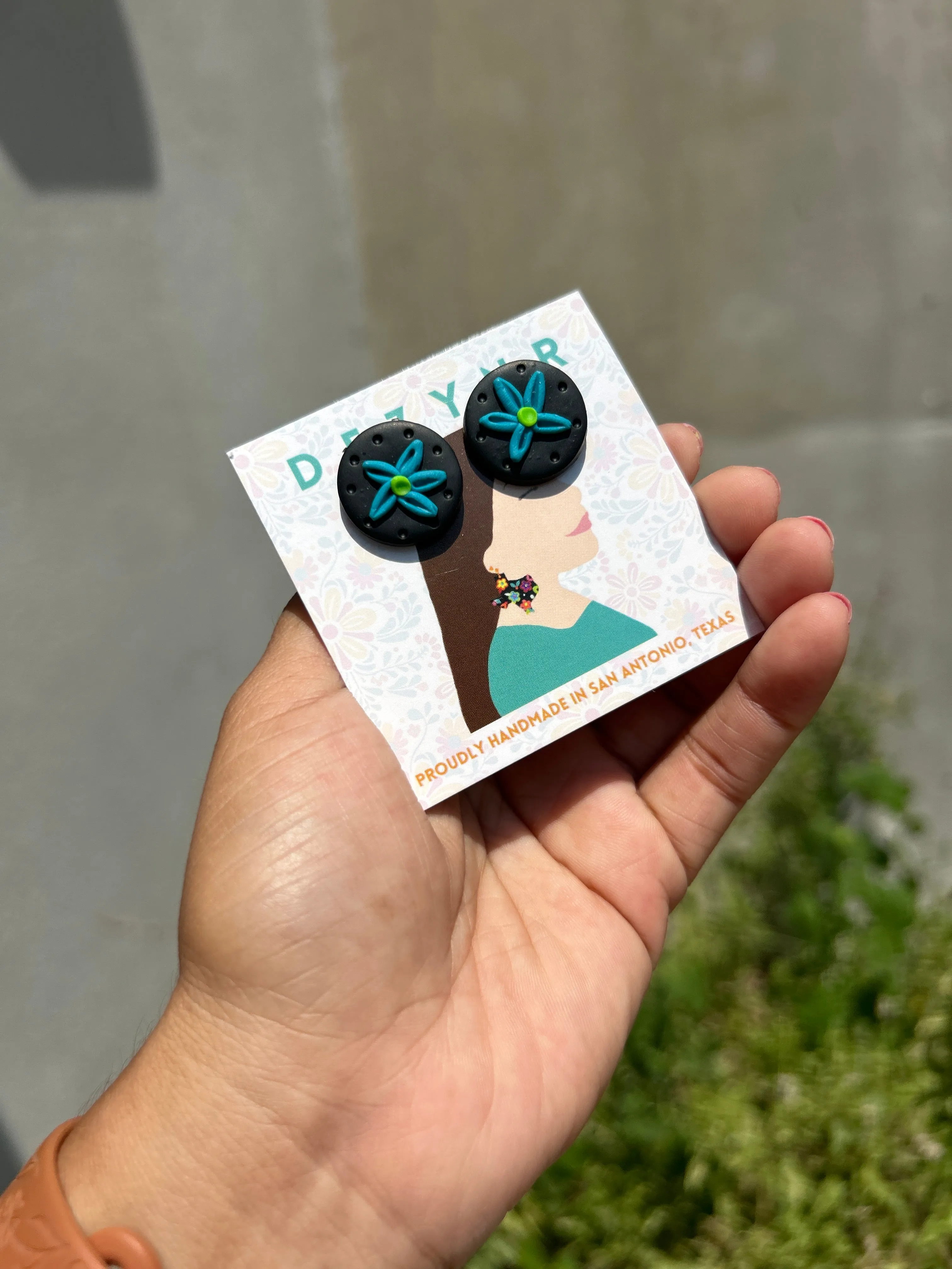 Teal flower circle studs
