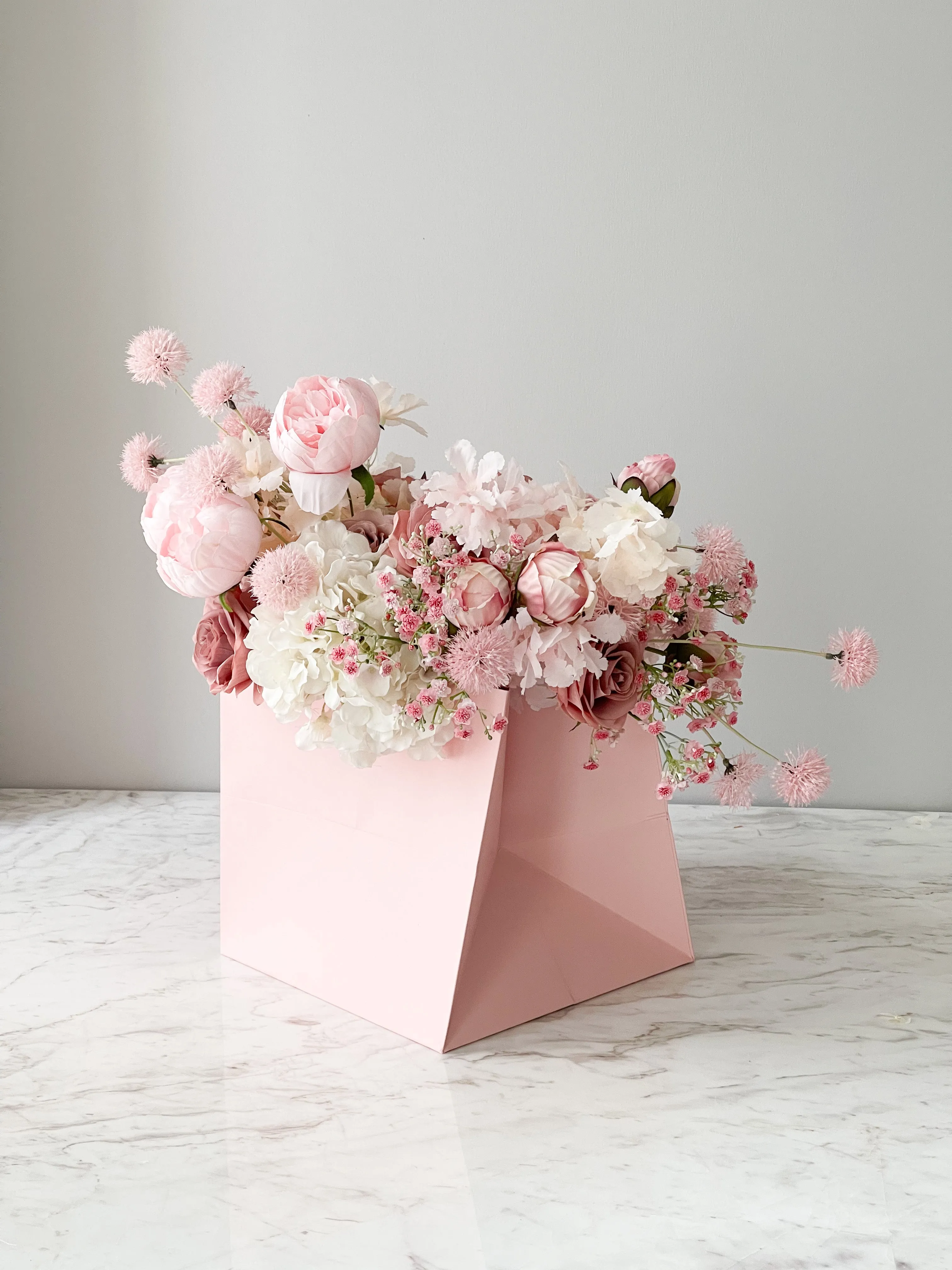 Water Resistant Square Flower/Gift Bag In Pink, White, And Grey Color